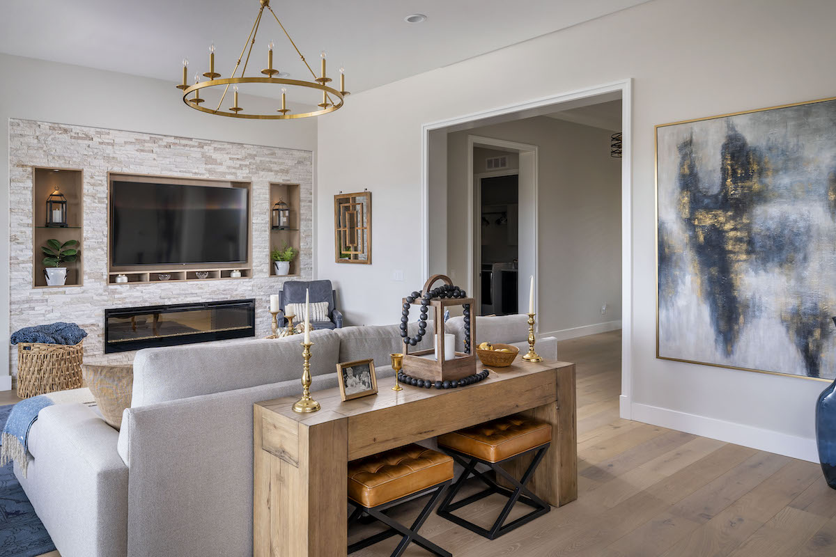 living-room-design-large-framed-artwork-leather-stools