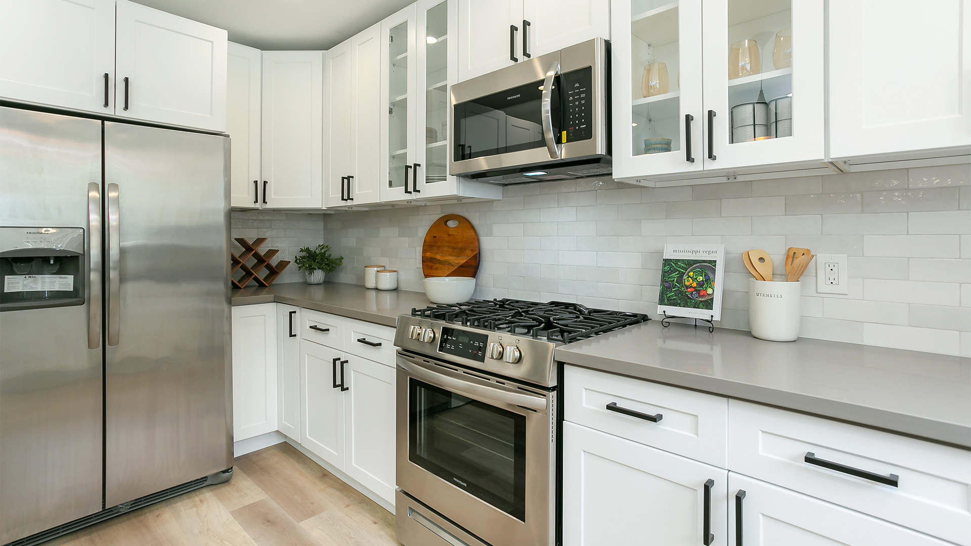 stainless-steel-kitchen-appliances-subway-tile-backsplash